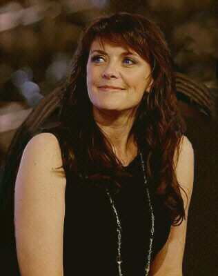 Amanda Tapping as
          Dr. Helen Magnus